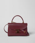 TEEN NINO BAG IN SMOOTH SATINATED CALFSKIN WITH ENAMEL CLOSURE