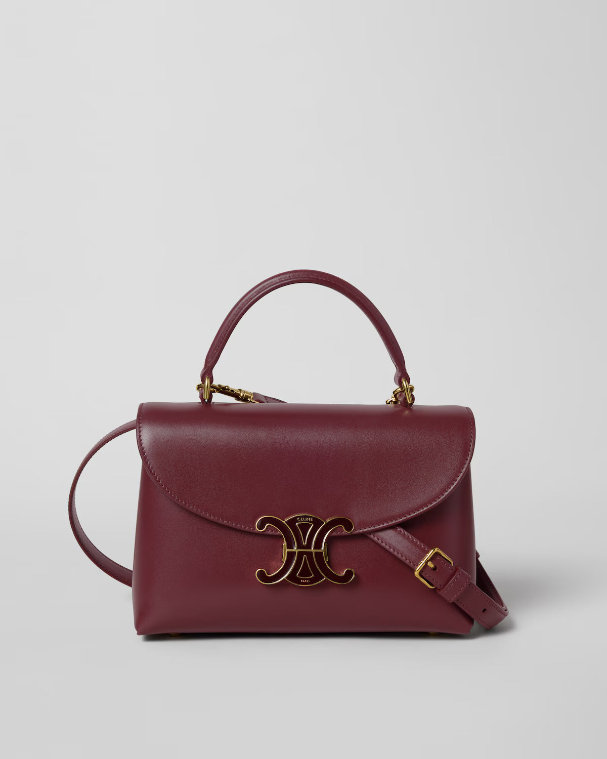 TEEN NINO BAG IN SMOOTH SATINATED CALFSKIN WITH ENAMEL CLOSURE