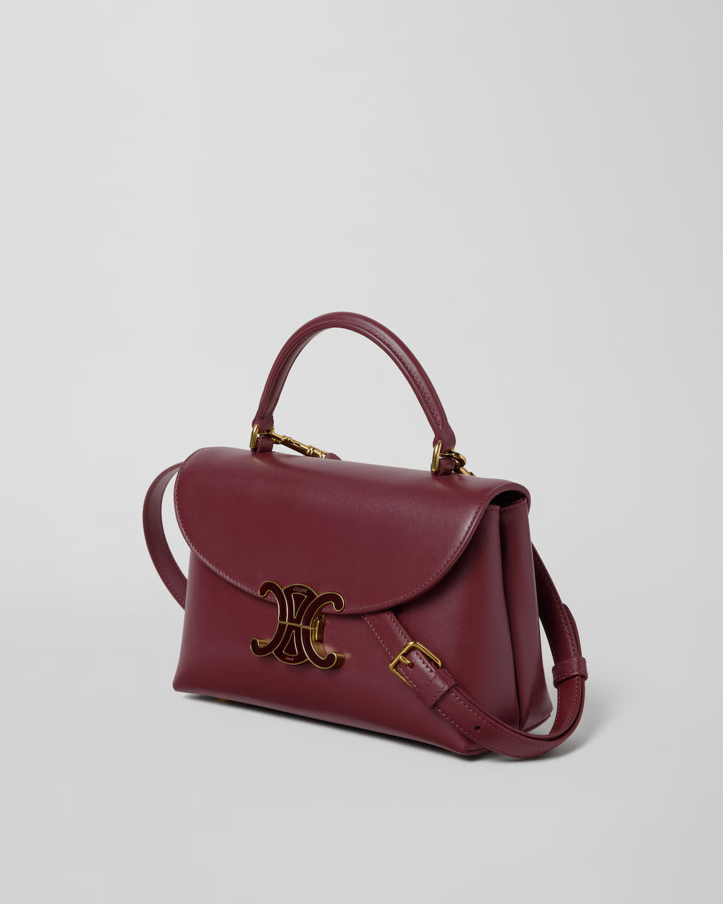 TEEN NINO BAG IN SMOOTH SATINATED CALFSKIN WITH ENAMEL CLOSURE