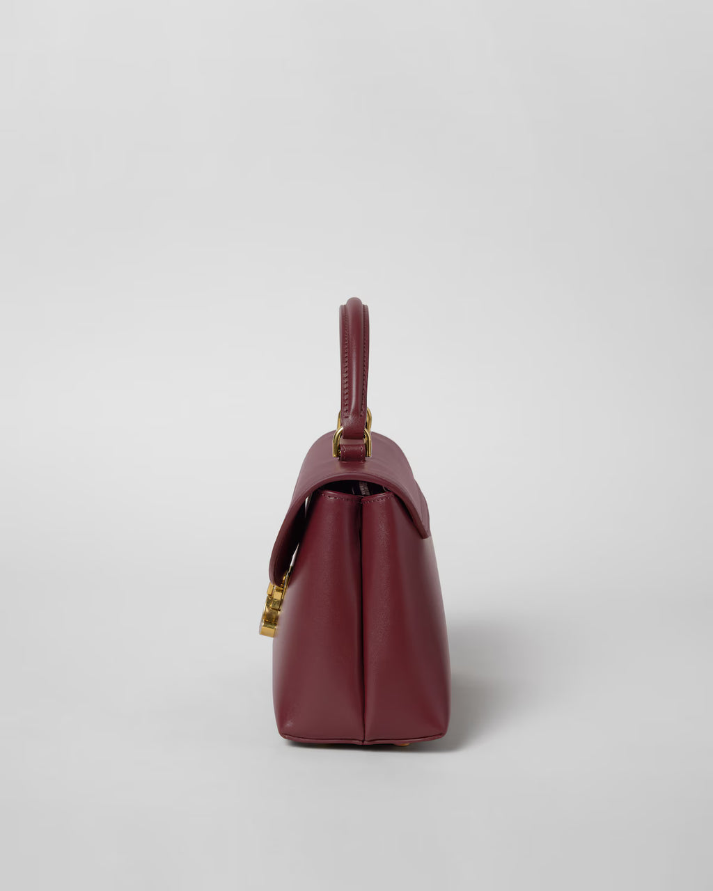 TEEN NINO BAG IN SMOOTH SATINATED CALFSKIN WITH ENAMEL CLOSURE