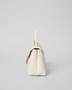TEEN NINO BAG IN SMOOTH SATINATED CALFSKIN WITH ENAMEL CLOSURE