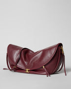 Soft Triomphe Halfmoon IN SHINY LAMBSKIN