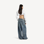 Cropped Shirt in white organdi cotton and silk poplin is from look 36 of Balenciaga's Summer 26 Collection. RUNWAY DELUXE