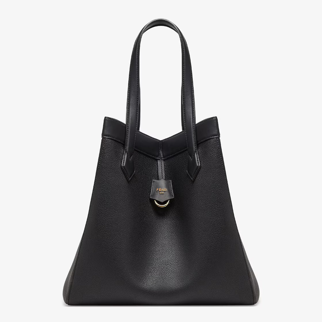 Black leather bag that can be transformed