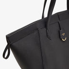Black leather bag that can be transformed