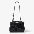 Black pony-effect leather bag