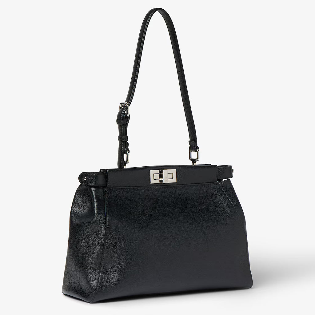 Black leather bag embroidered with mirrors