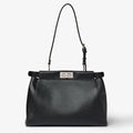 Black leather bag embroidered with mirrors