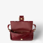 Burgundy inlaid hagfish leather bag