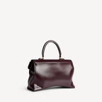 Women's Hourglass Avenue Top Handle Bag Medium in Raisin RUNWAY DELUXE