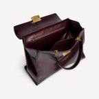 Women's Hourglass Avenue Top Handle Bag Medium in Raisin RUNWAY DELUXE