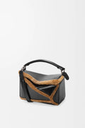 Small Puzzle Aviator bag in glossy lambskin and shearling