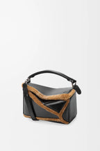Small Puzzle Aviator bag in glossy lambskin and shearling