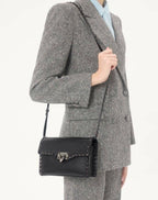 Small Rockstud Grainy Calfskin Crossbody Bag