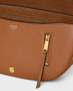SOFT TRIOMPHE LITTLE HALFMOON IN SHINY LAMBSKIN