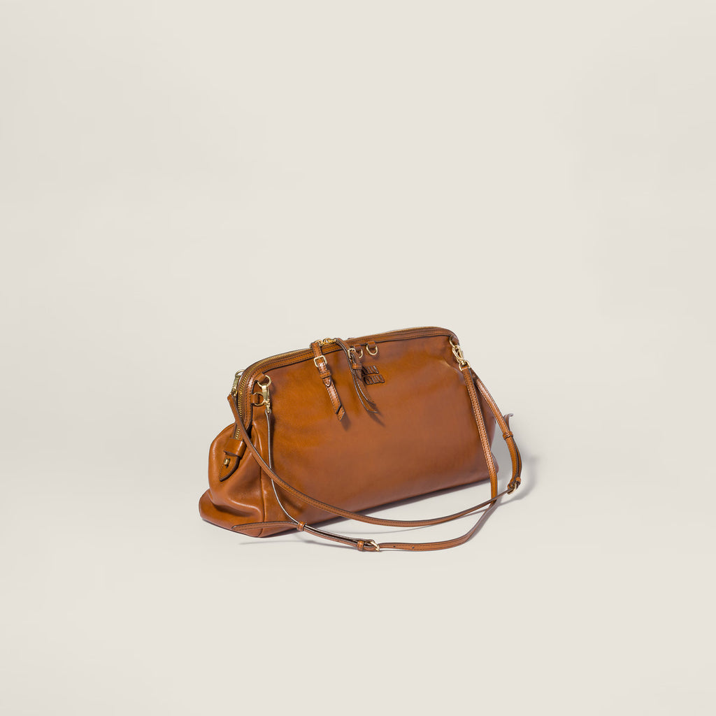 Caprice leather clutch