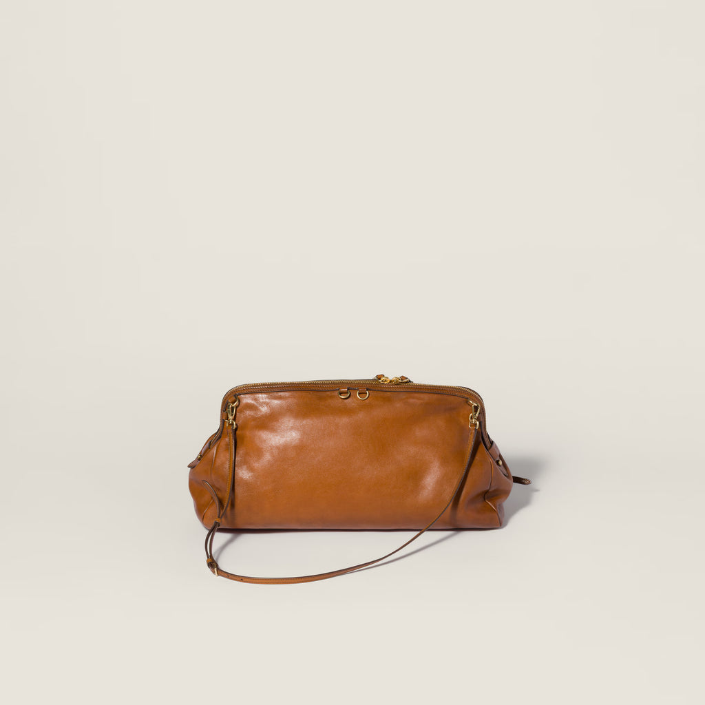 Caprice leather clutch