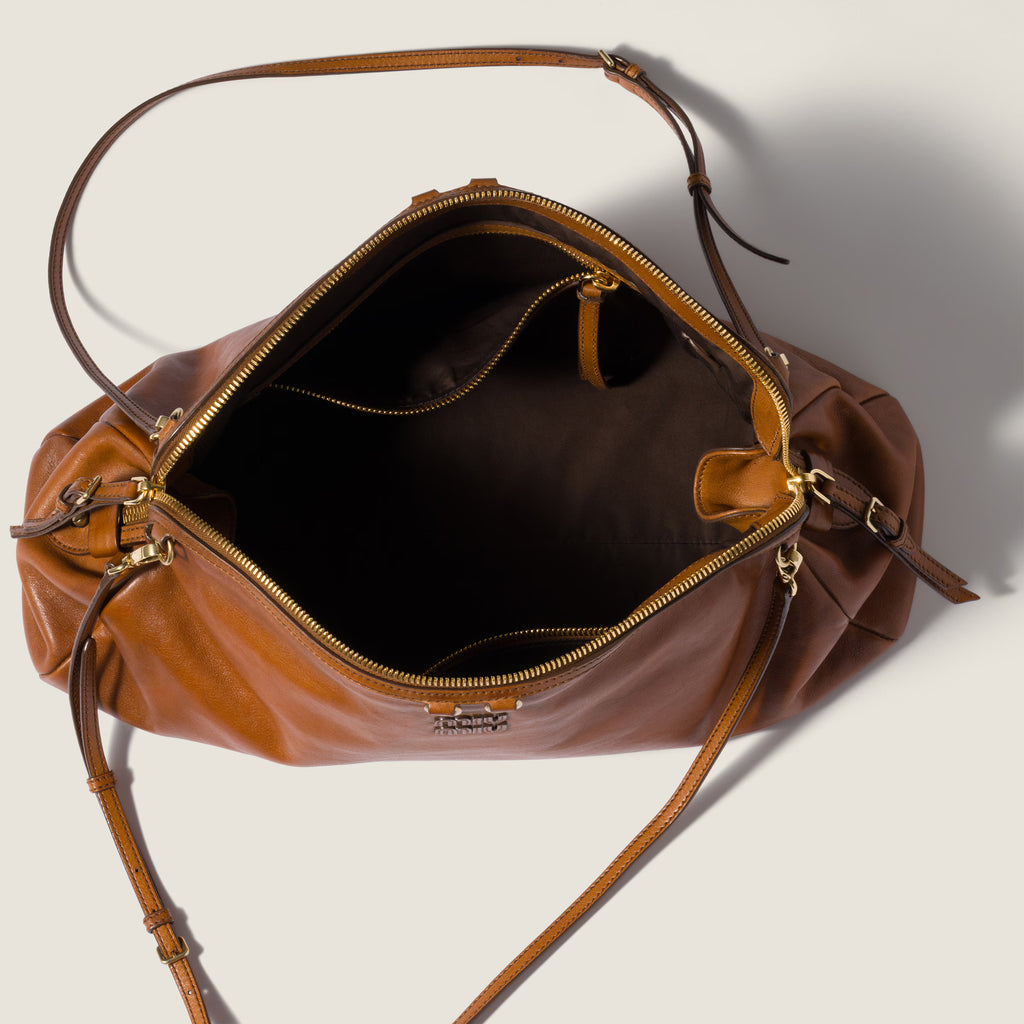Caprice leather clutch