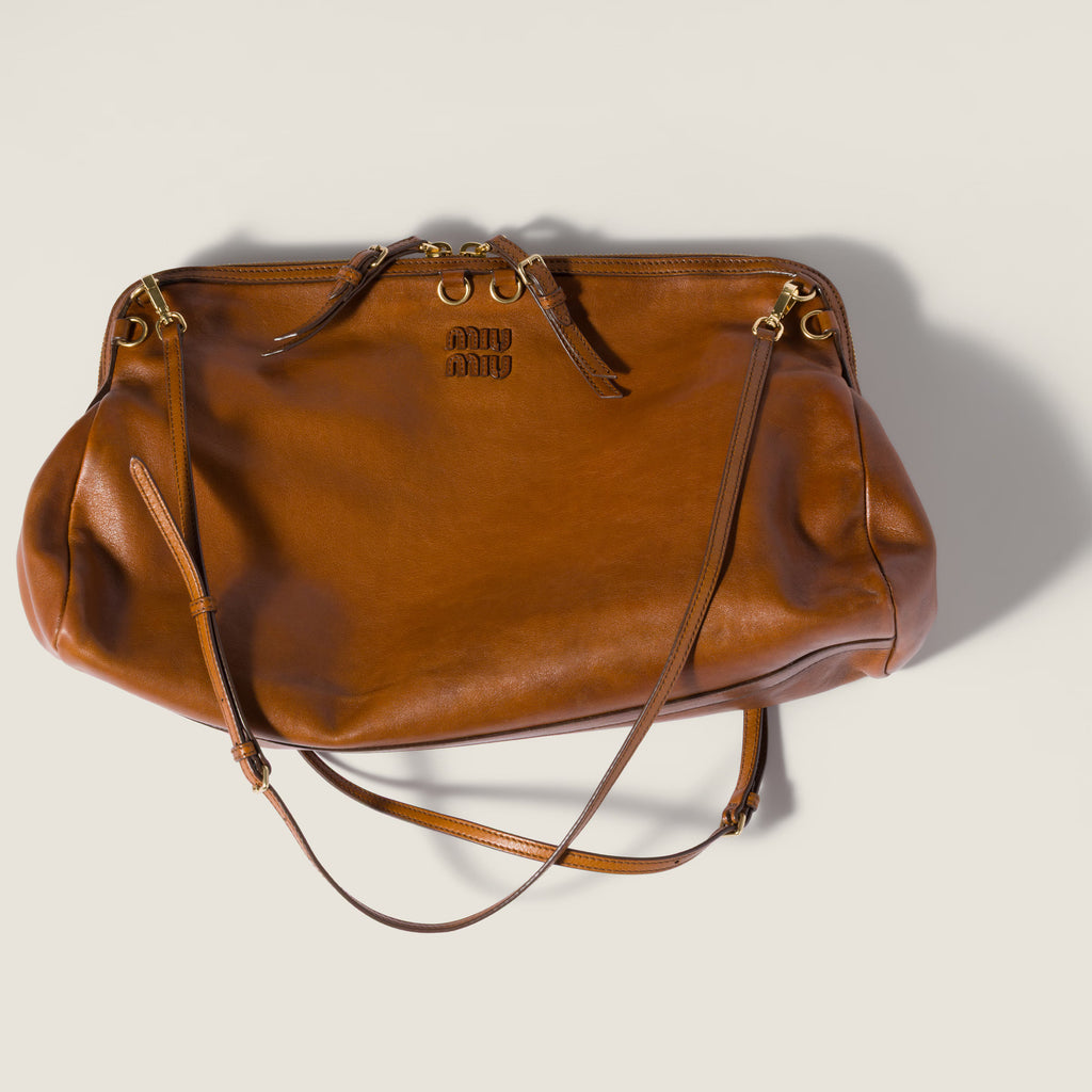 Caprice leather clutch