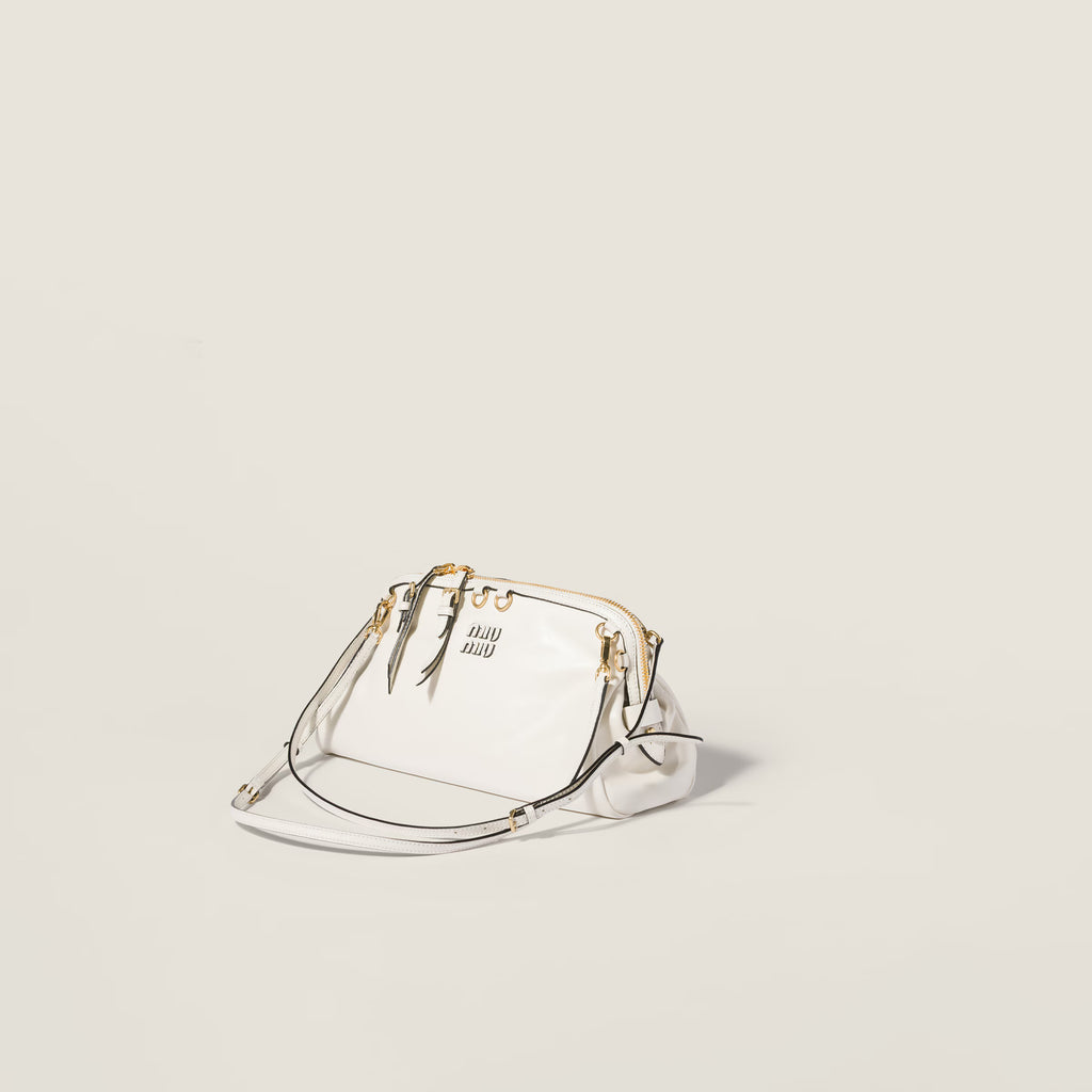 Caprice shiny leather clutch