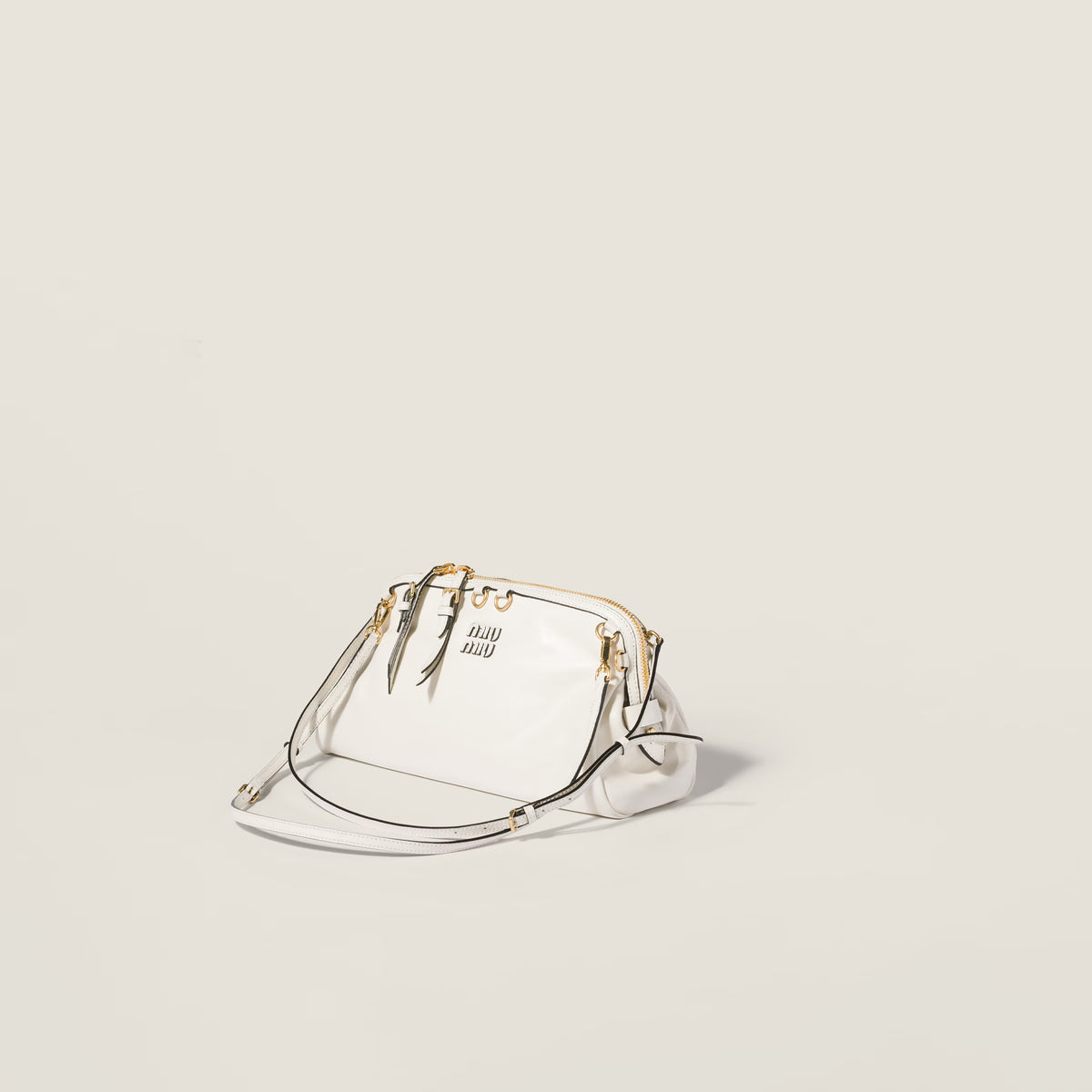 Caprice shiny leather clutch