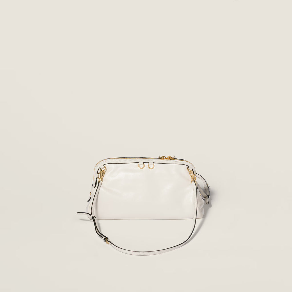 Caprice shiny leather clutch