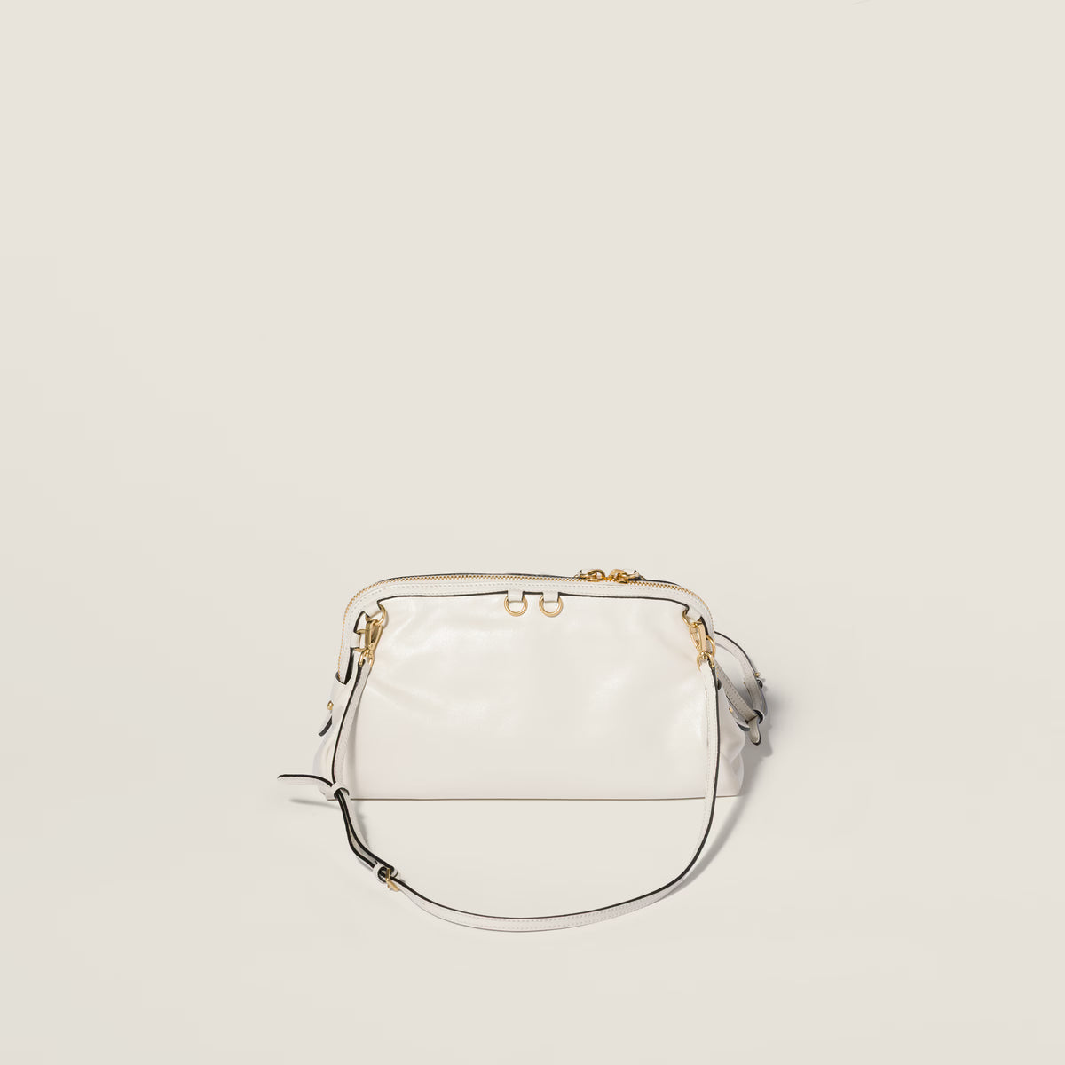 Caprice shiny leather clutch