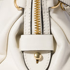 Caprice shiny leather clutch