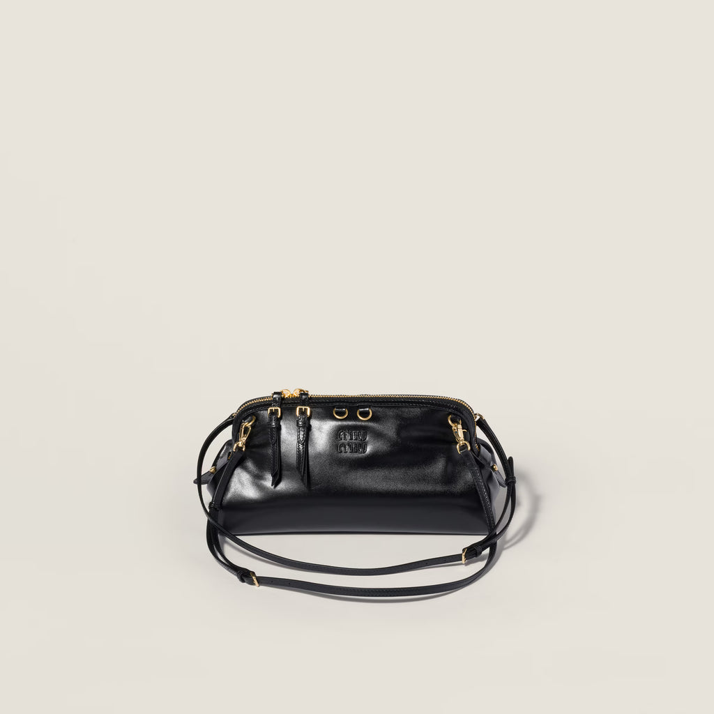 Caprice shiny leather clutch