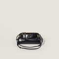 Caprice shiny leather clutch