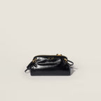 Caprice shiny leather clutch
