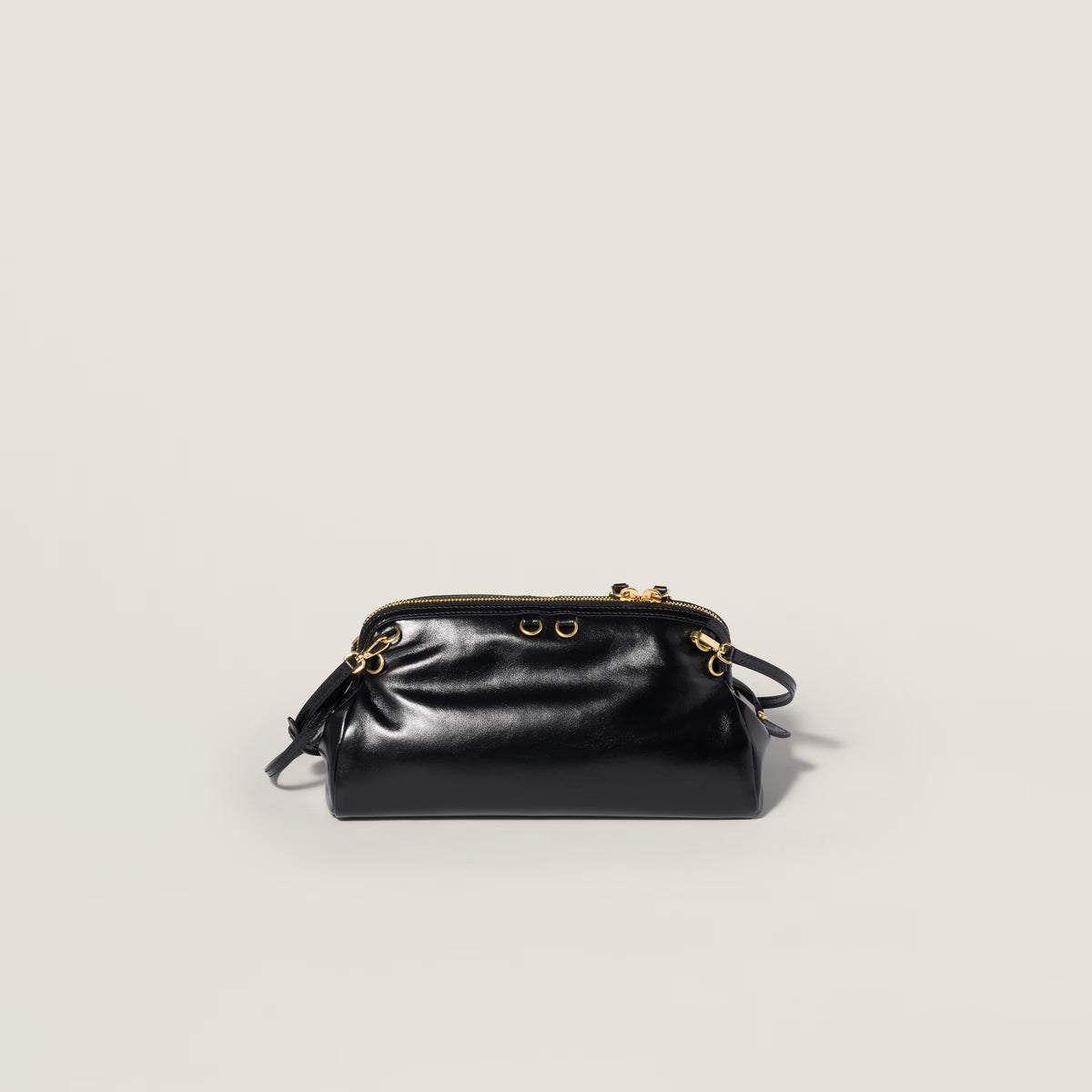 Caprice shiny leather clutch