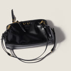 Caprice shiny leather clutch