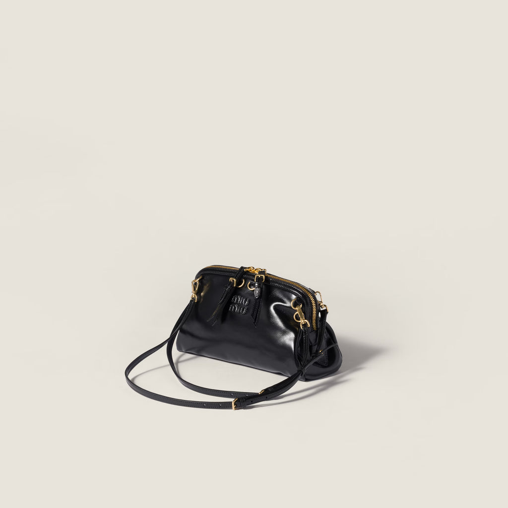 Caprice leather clutch