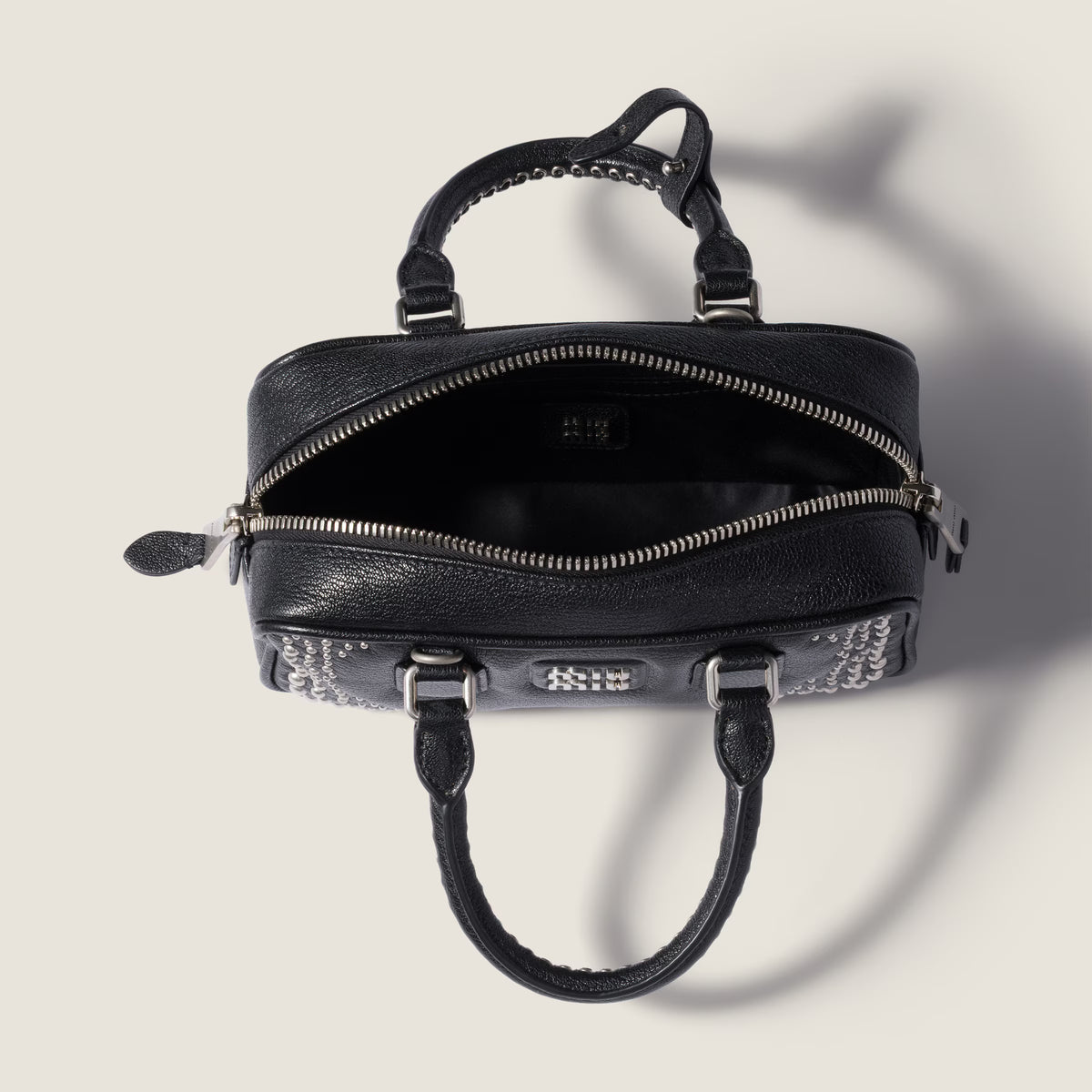 Arcadie studded leather bag RUNWAY DELUXE