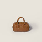 Arcadie studded leather bag RUNWAY DELUXE