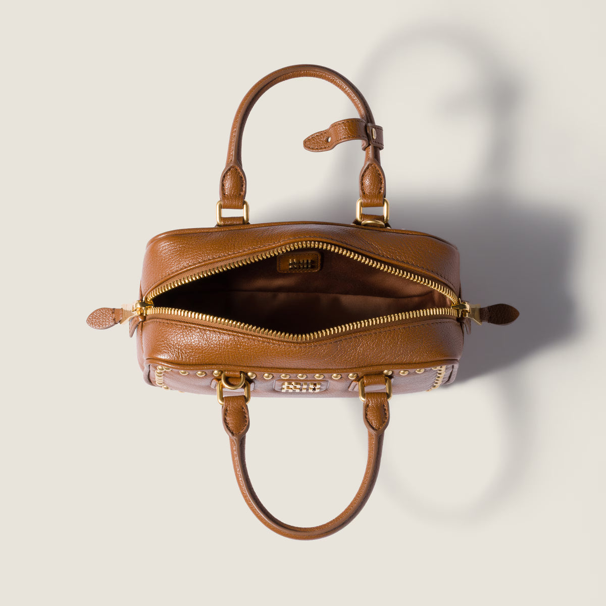Arcadie studded leather bag RUNWAY DELUXE