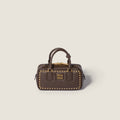 Arcadie studded leather bag RUNWAY DELUXE