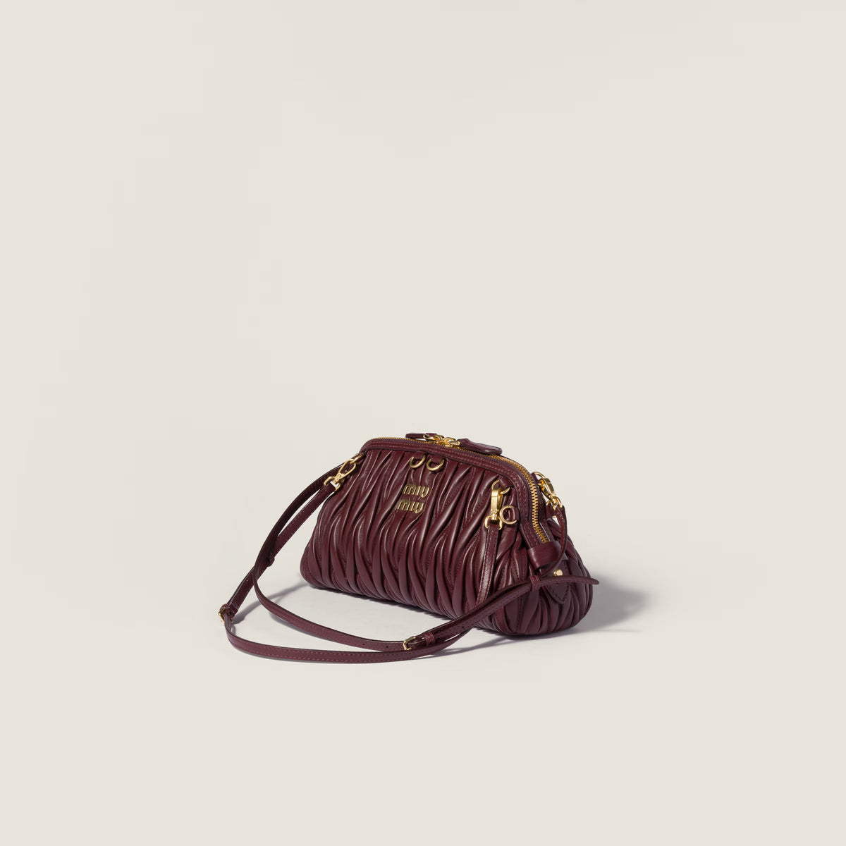 Caprice matelassé nappa leather clutch