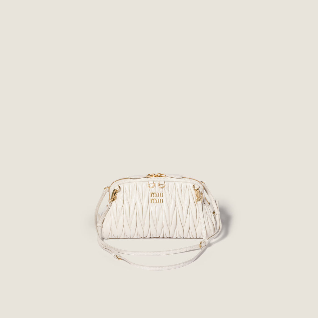 Caprice matelassé nappa leather clutch