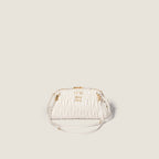 Caprice matelassé nappa leather clutch