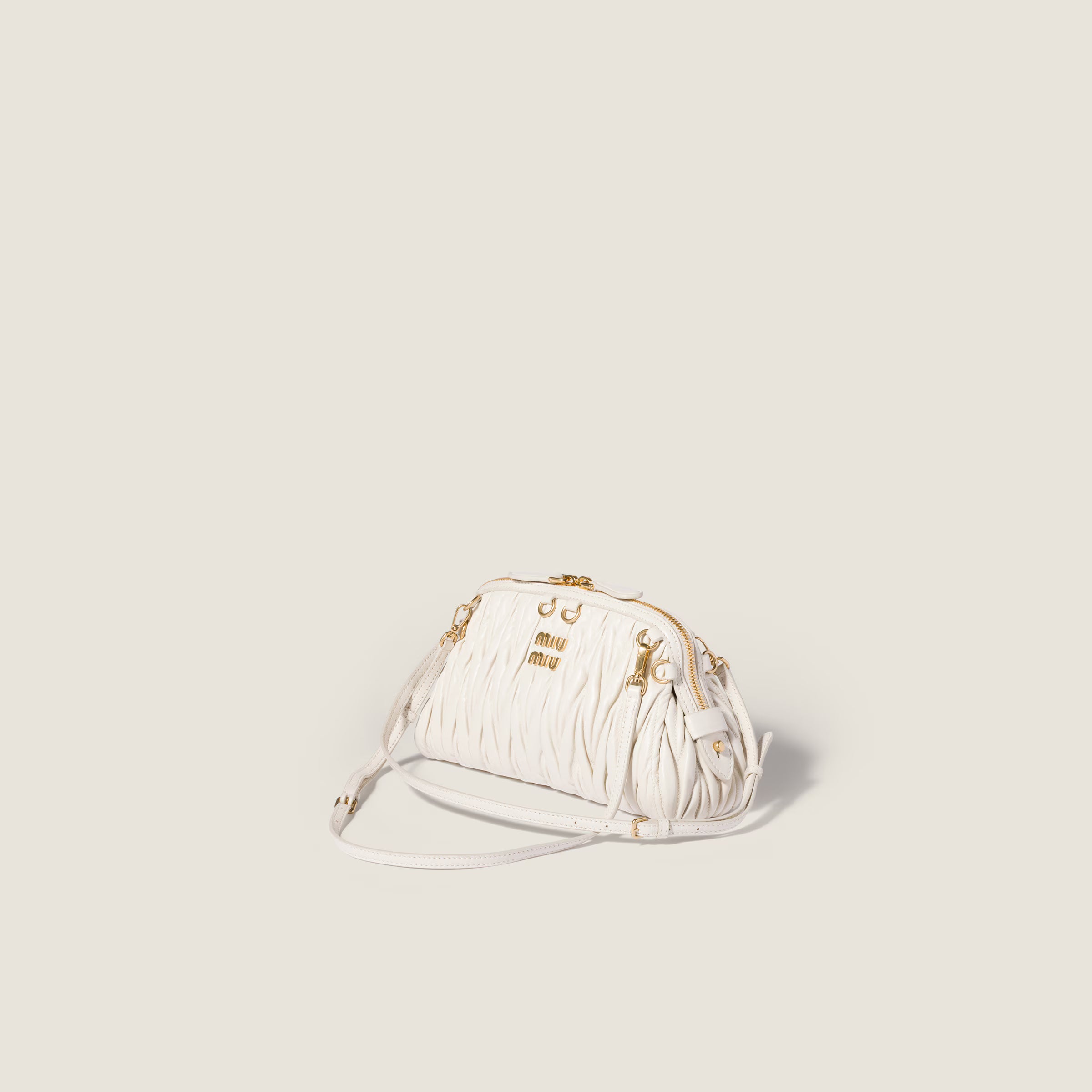 Caprice matelassé nappa leather clutch