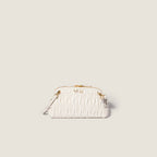 Caprice matelassé nappa leather clutch