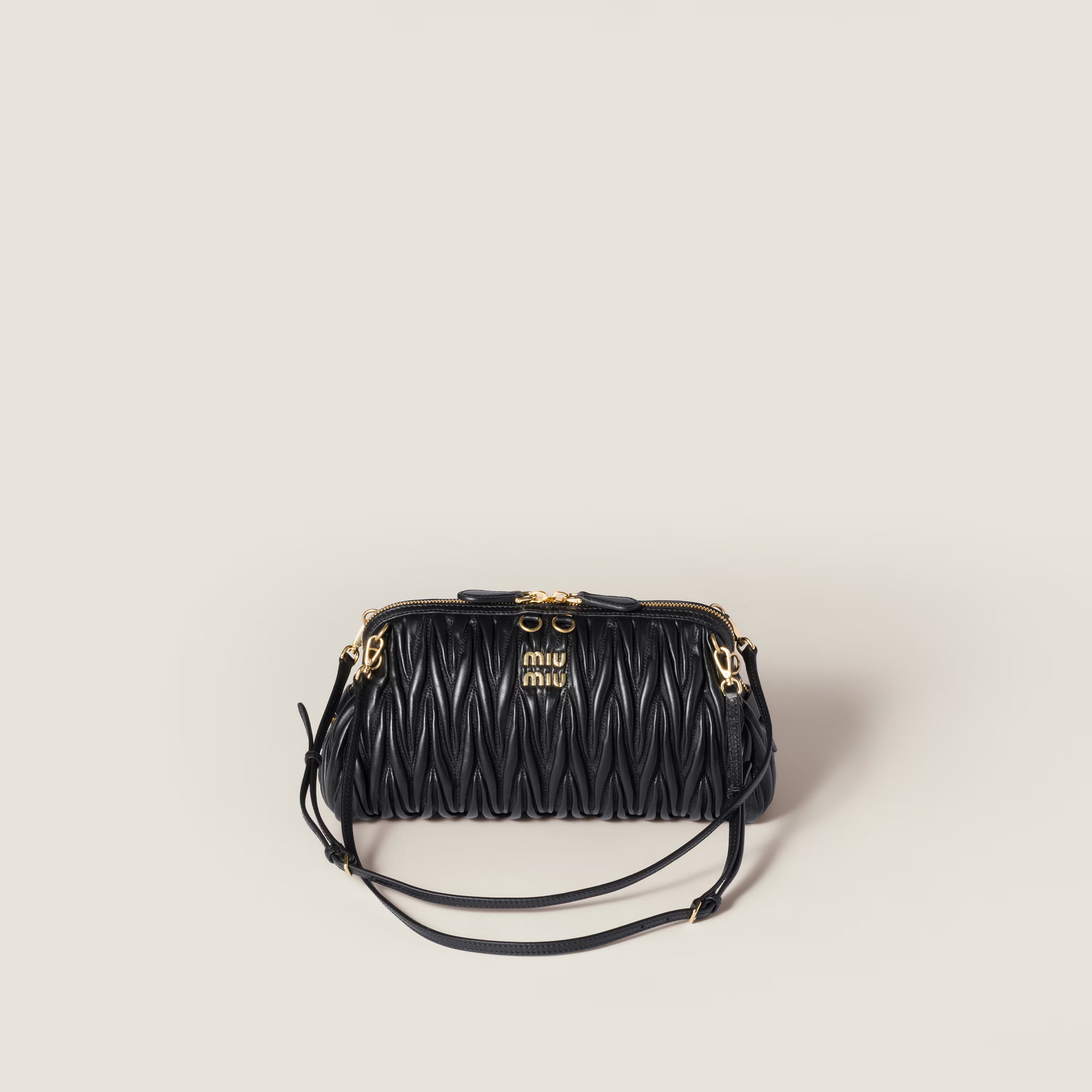 Caprice matelassé nappa leather clutch