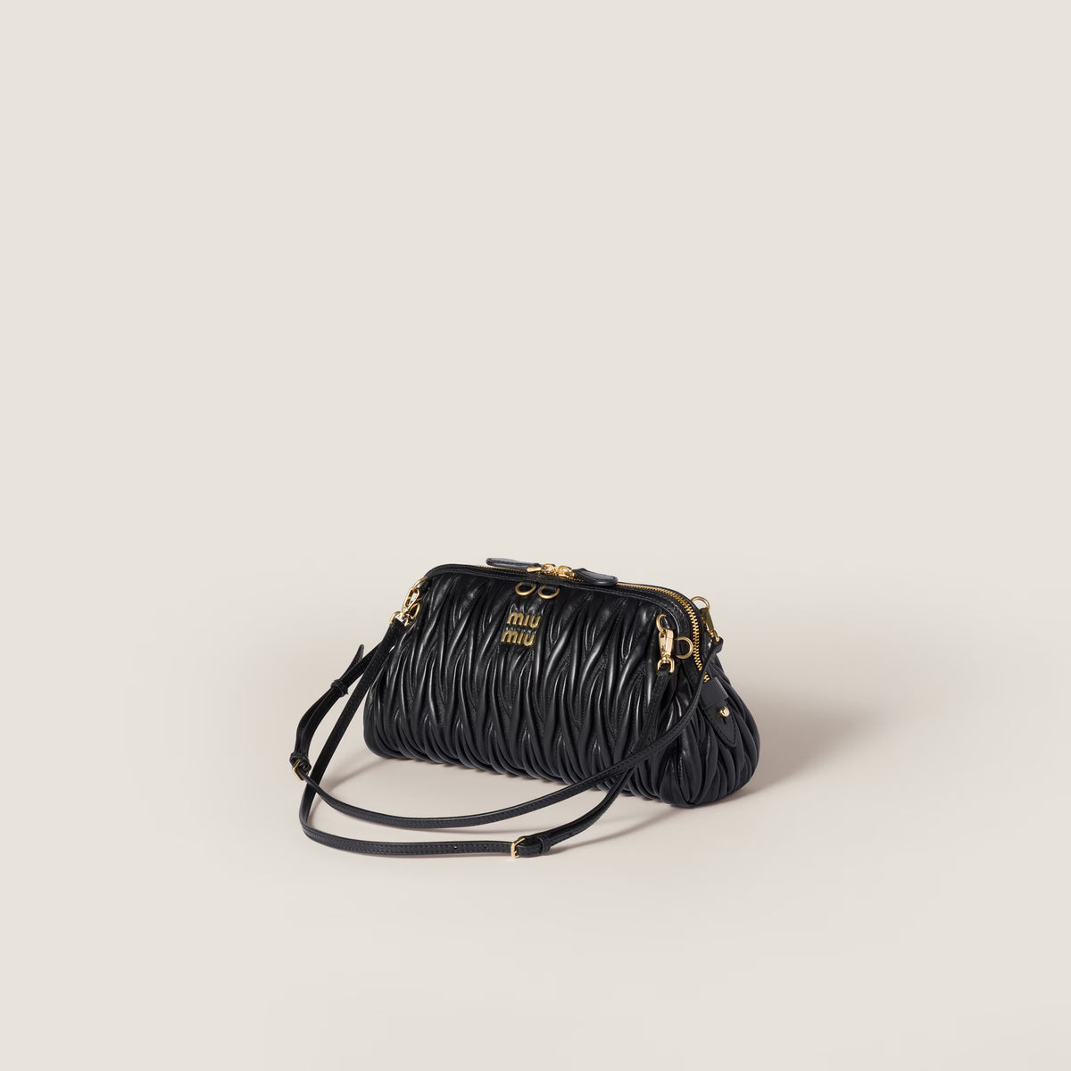 Caprice matelassé nappa leather clutch