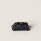 Caprice matelassé nappa leather clutch