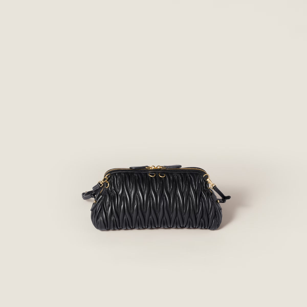 Caprice matelassé nappa leather clutch