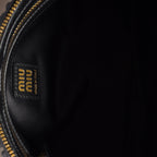 Caprice matelassé nappa leather clutch